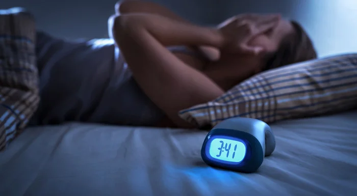 woman with disrupted sleep