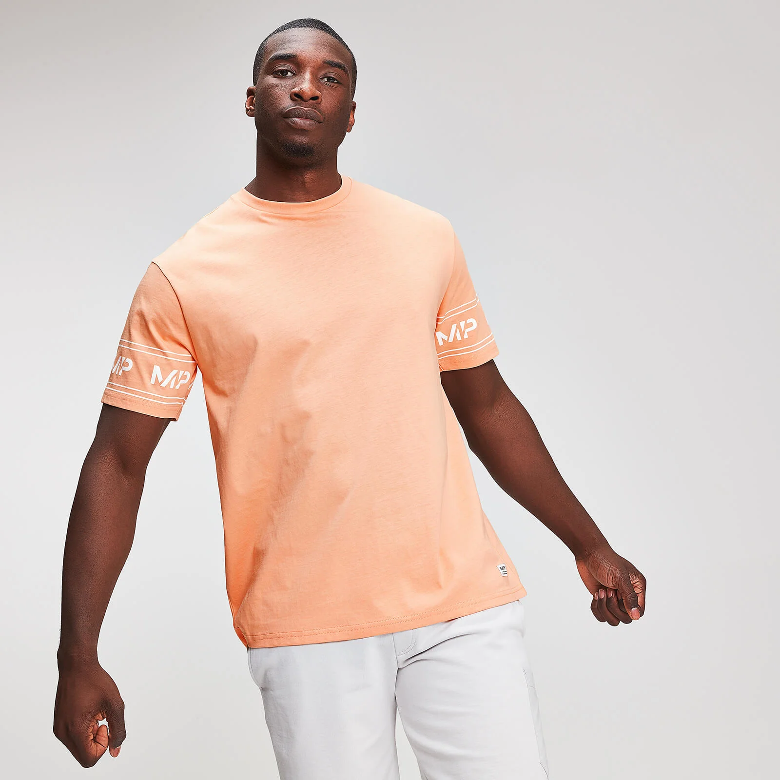 T-shirt à manches longues avec logo graphique Myprotein - Orange - XS Image 1