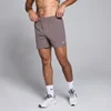 Short d’entraînement tissé avec entrejambe de 13 cm MP pour homme – Moka