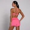Brassière de sport ajustable dos croisé Tempo MP femme - Rose vif
